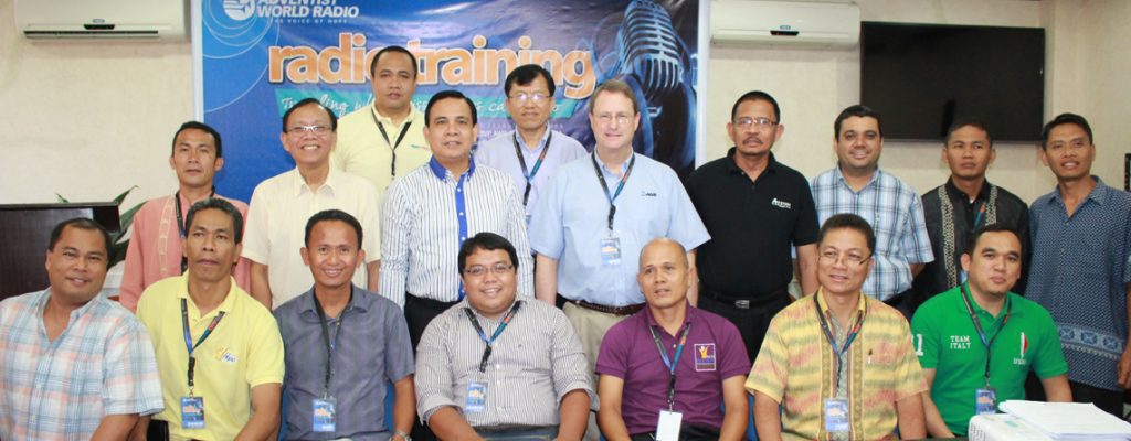 Station managers with organizers and presenters.